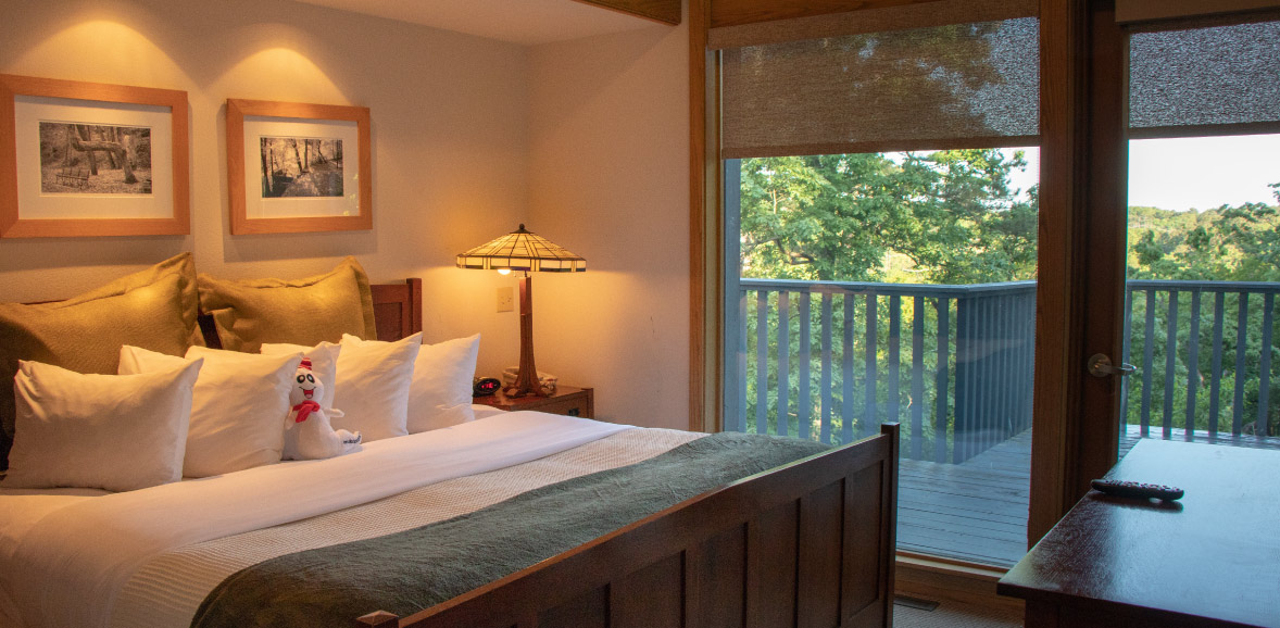 A view of a beautiful bedroom within one of the suites.